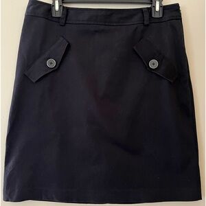 DANA BUCHMAN Women’s Black Mini Skirt. 4 Mock Pockets. Side Zip. Size 10